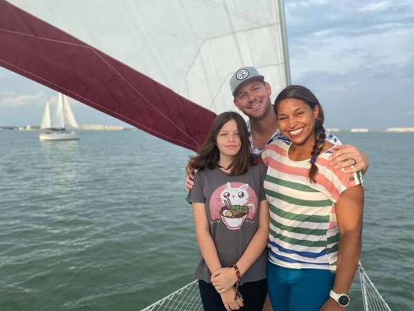 Mika, Brain, and Daughter Jade at boat.